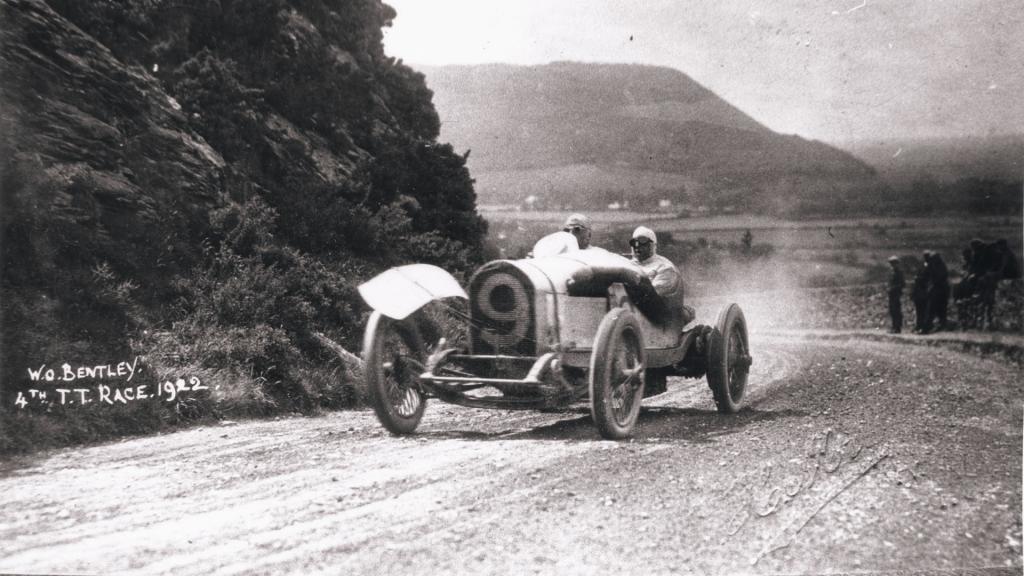 Legacy Bentley Blower driving on unpaved race track