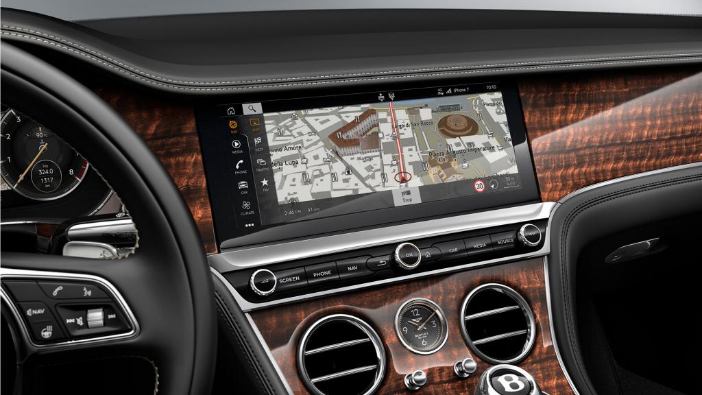 Bentley Continental GTC Signature model, interior driver side view overlooking 12.3 inch infotainment display touch screen.