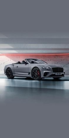 Front side angled view of Bentley Continental GTC S V8 in Cambrian Grey colour, featuring 22 inch Ten Spoke Sports Wheel - Black Painted and Ceramic brakes with red callipers.