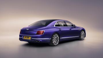 Bentley Flying Spur Mulliner in Tanzanite Purple colour, rear view with Chrome ‘BENTLEY’ lettering to Boot and Full LED tail lamps.