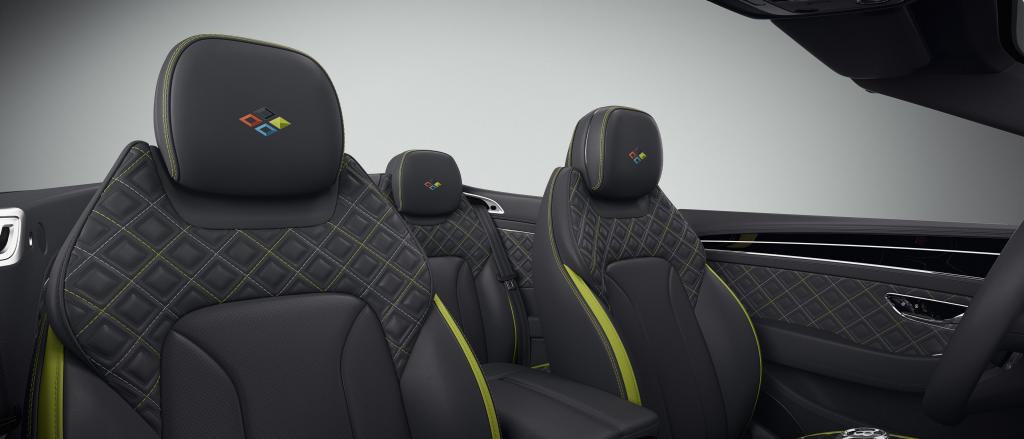 Front seats of Continental GTC Speed featuring lofted diamond-quilted seats with custom emblem. 