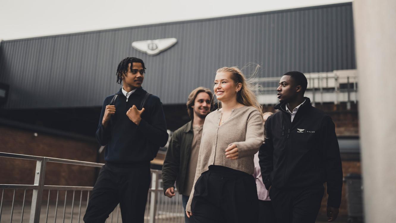 Bentley 2025 Early Careers members walking away from the Design Studio building.