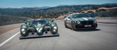 Bentley Breitling F1 car and Bentley Continental GT Le Man's edition in Verdant Green colour driving along a racetrack.