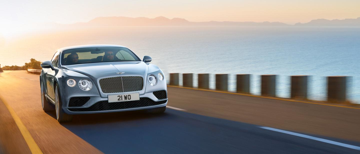 A 2019 Bentley Continental GT driving in rural environments