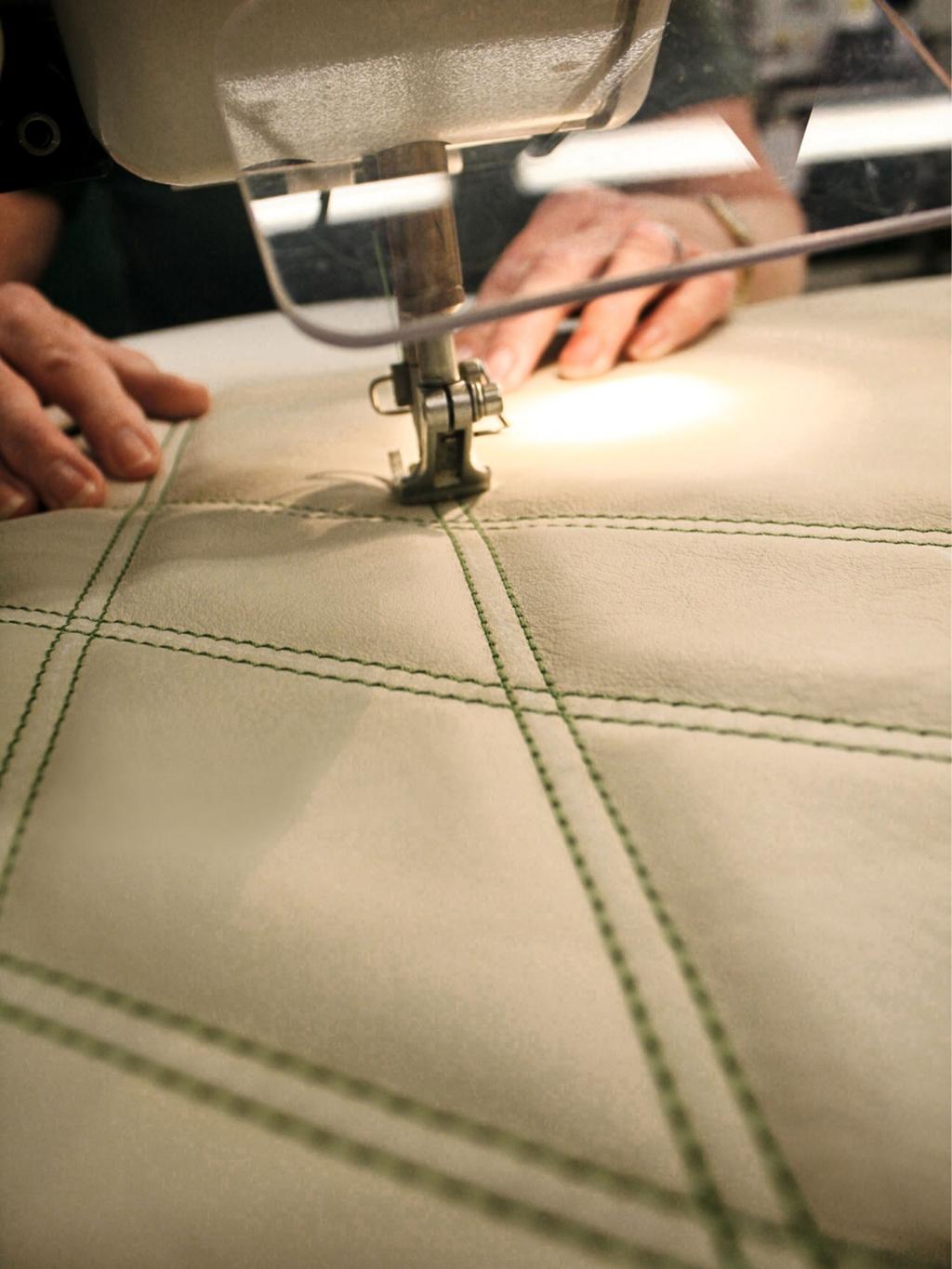 Contrast embroidery and stitching for Portland hide being done by a precision sewing machine.