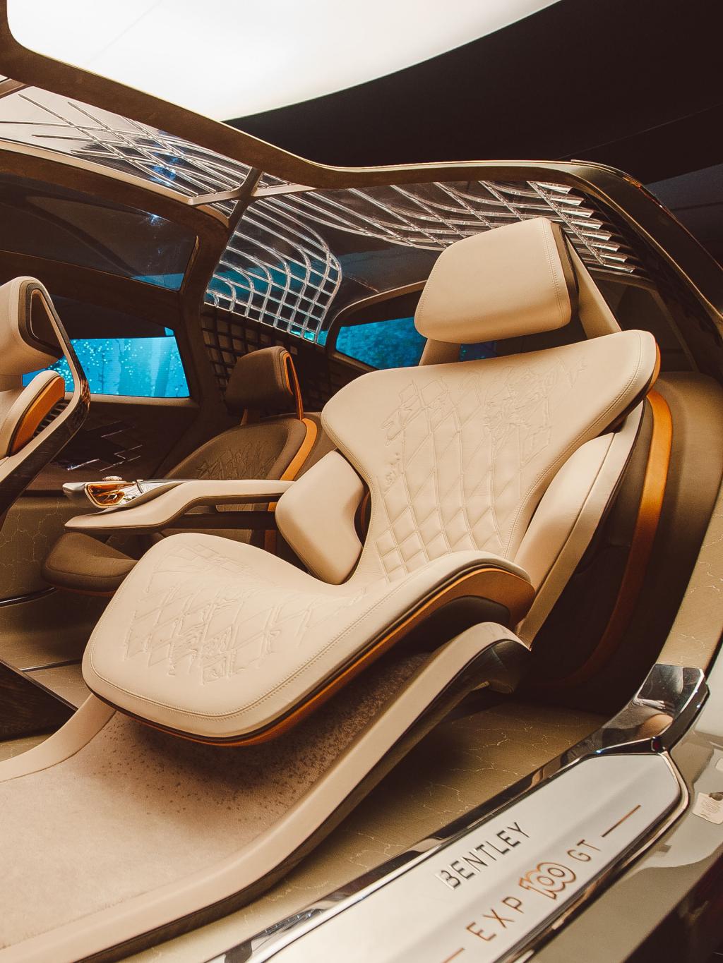 Side angled view of Bentley EXP 100 GT interior, featuring Adaptable Biometric Seating.