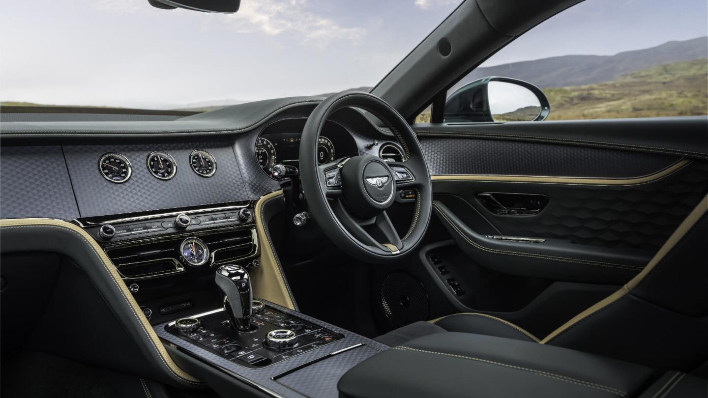 Front cabin of the new Flying Spur Mulliner hybrid with a duo tone cabin and technical finish veneer