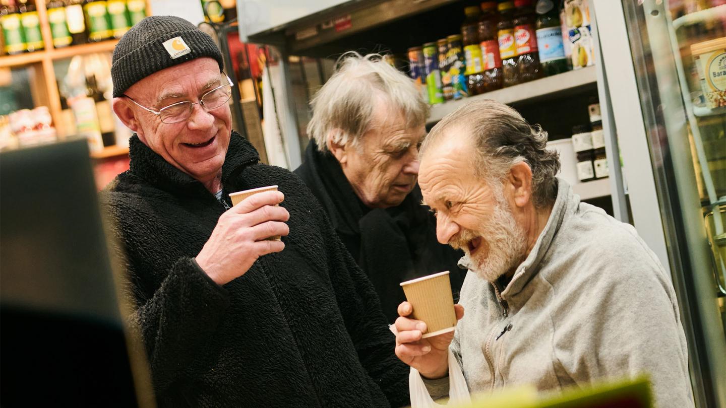 A few patrons stood in Salvino's, drinking coffee.
