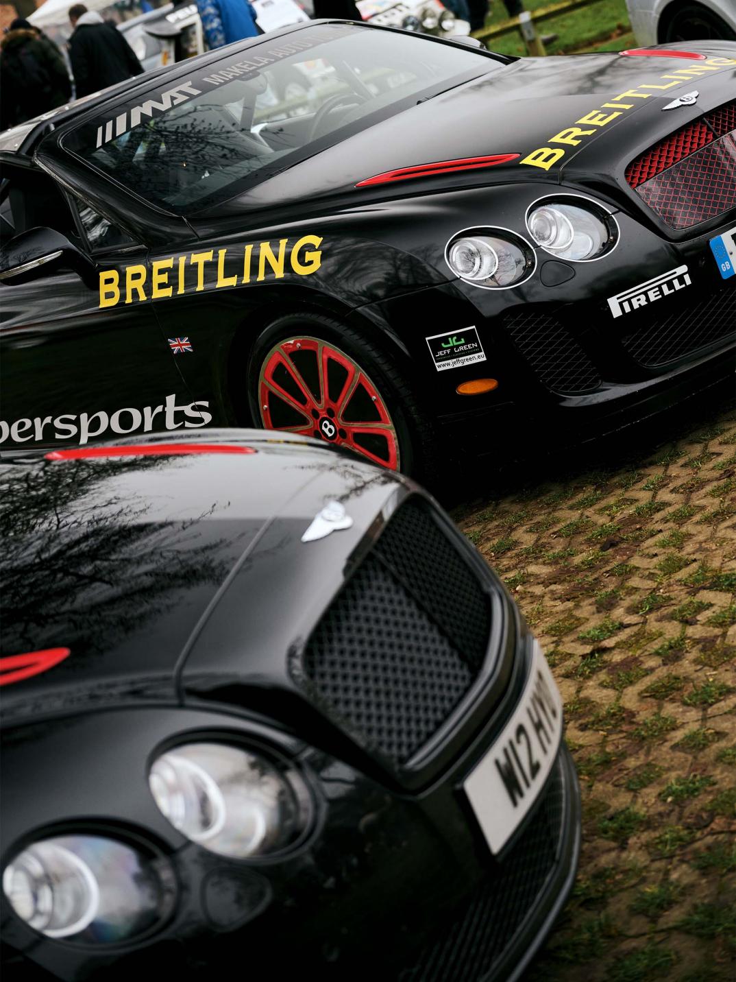 Chart Chirathivat's Bentley Supersports ISR on grass with the original Ice Speed Record car.