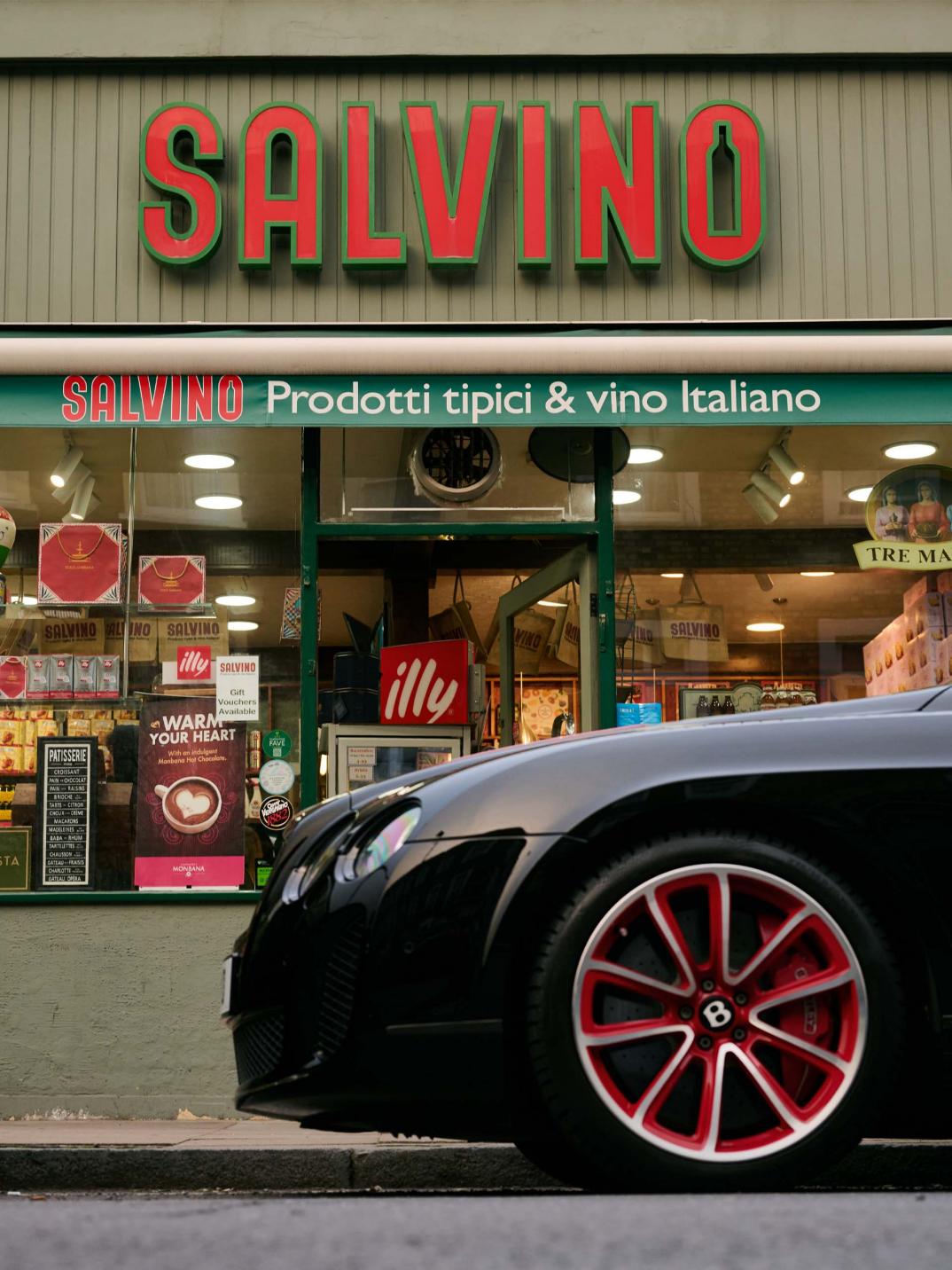 Chart Chirathivat's Bentley Supersports ISR parked up on the road outside Salvino's.