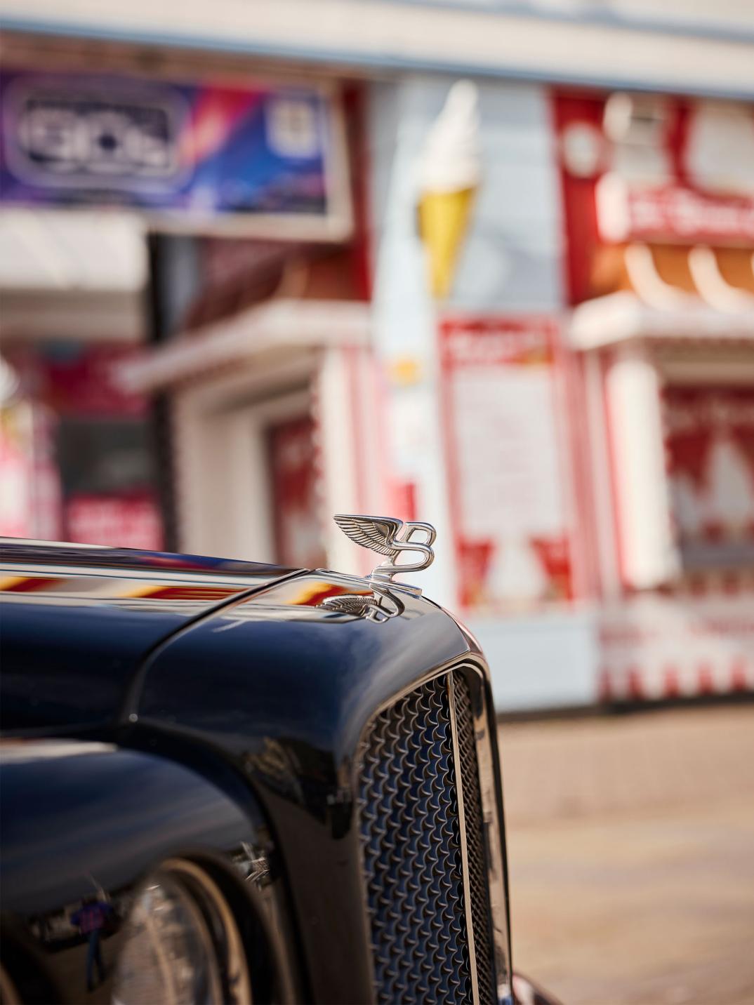Flying B of Hubert de Pelet's Bentley Arnage T in front of a pier.