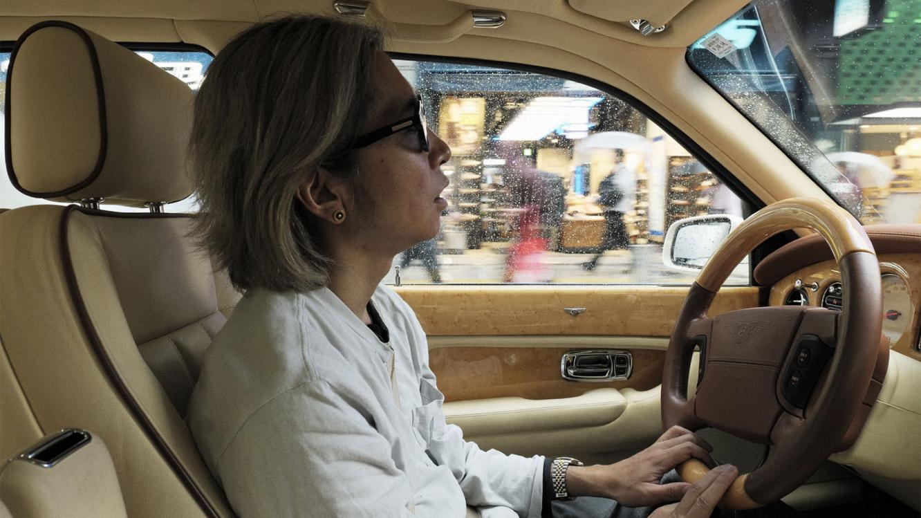 Kota driving his Bentley Arnage.