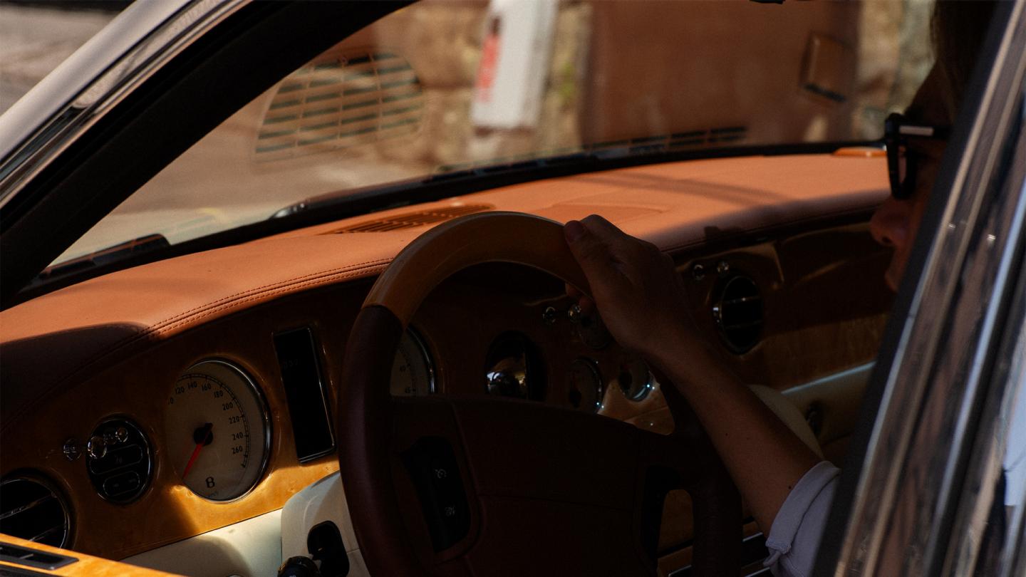 View through the driver's side window into Kota's Bentley Arnage.