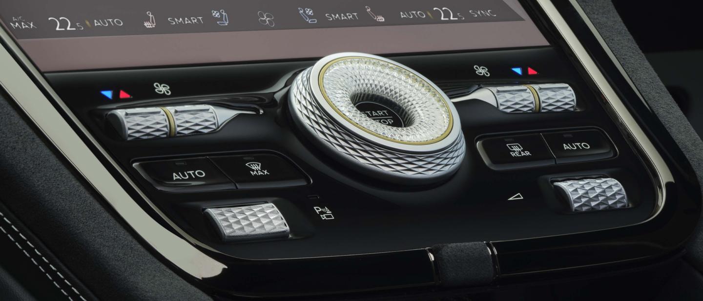 Close up of Bentley Torcal Drive Mode Selector and central screen.