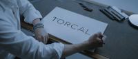 Torcal being written on a piece of paper.
