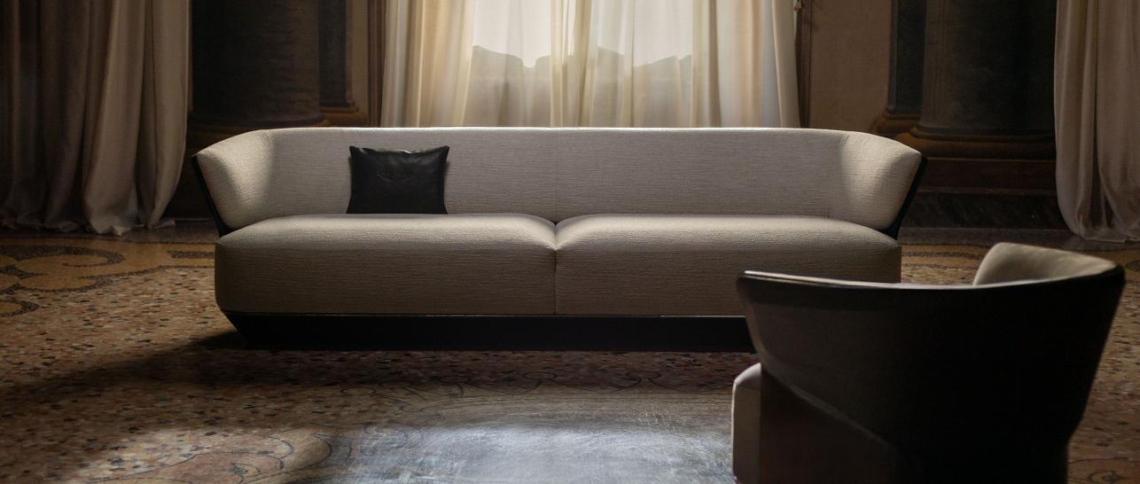 Bentley Home furniture, featuring the Embrace Sofa and Armchair.
