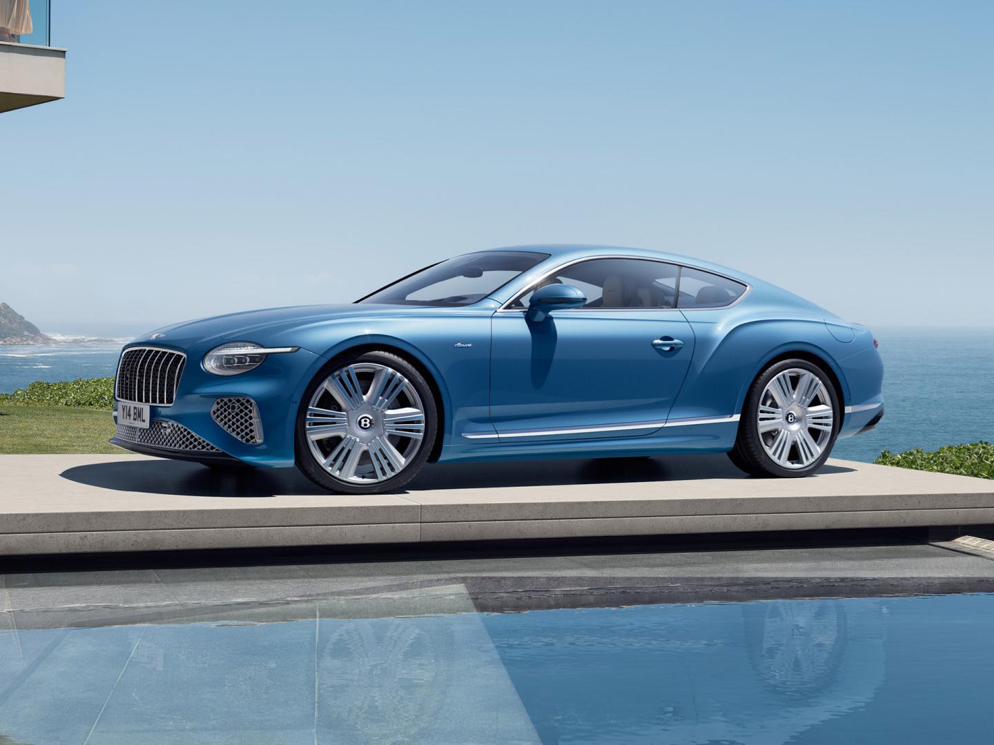 Front three quarter of the new hybrid Bentley Continental GT Mulliner with a Patina exterior colour and exclusive Mulliner 22" directional wheels