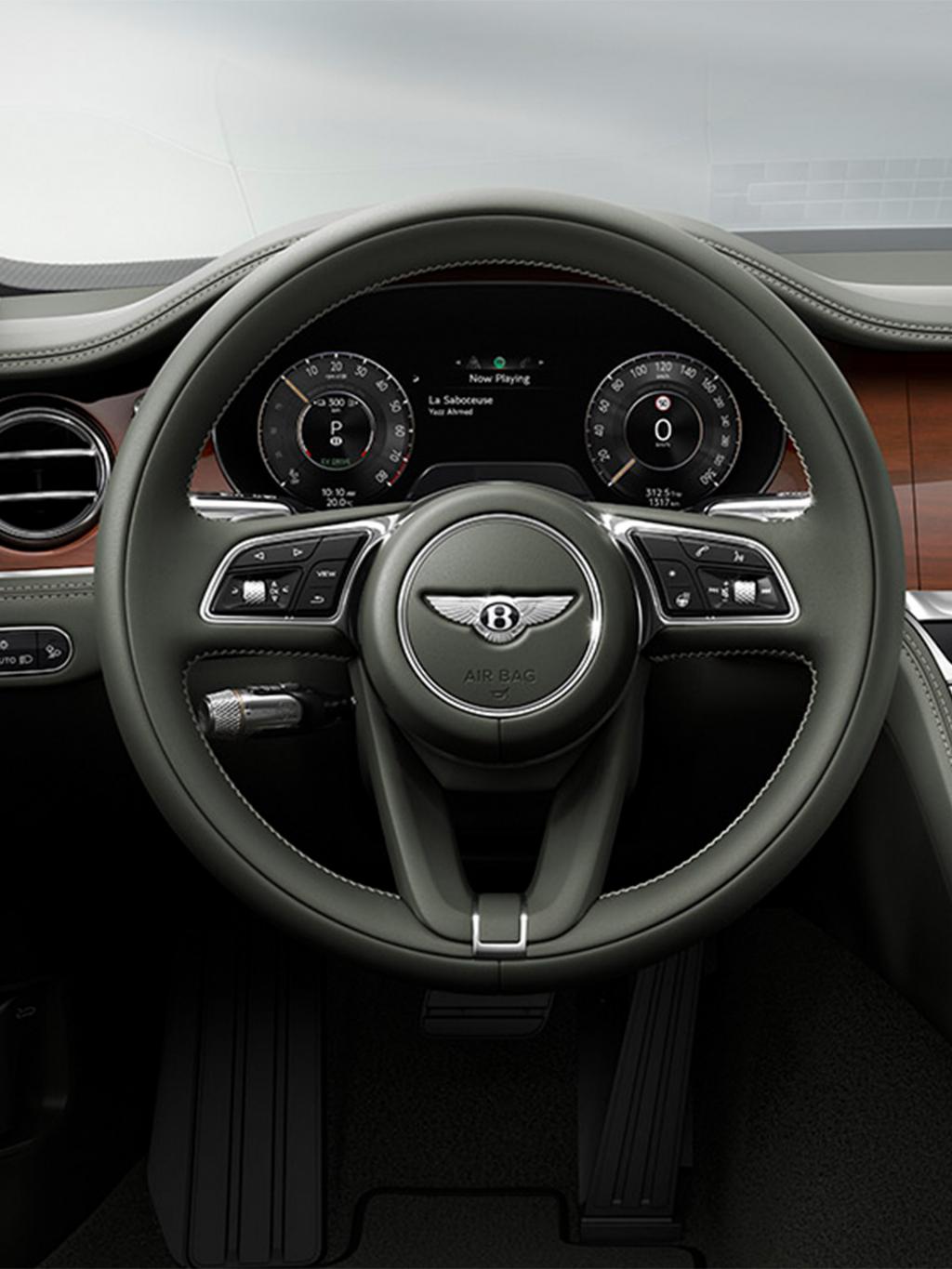 Close up of the steering wheel in the new hybrid Flying Spur