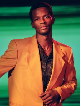 A model/ person in orange suit 