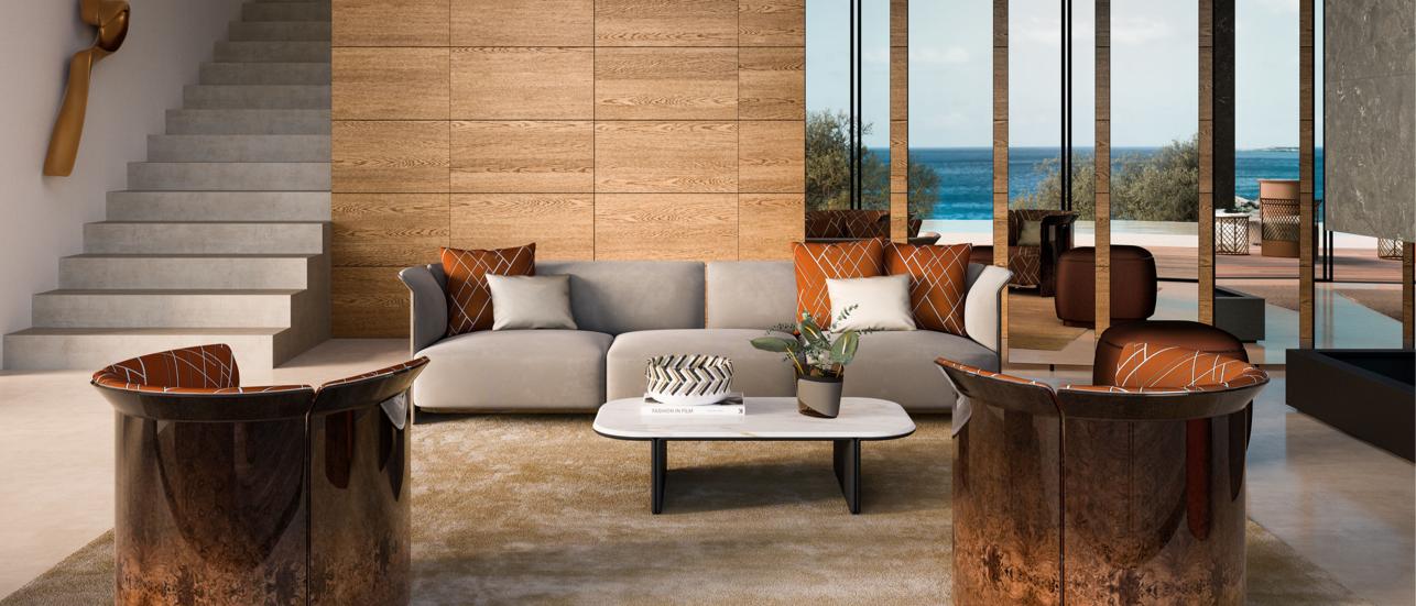Bentley Home furniture including a long Sofa with coffee table and couches inside a beachside villa