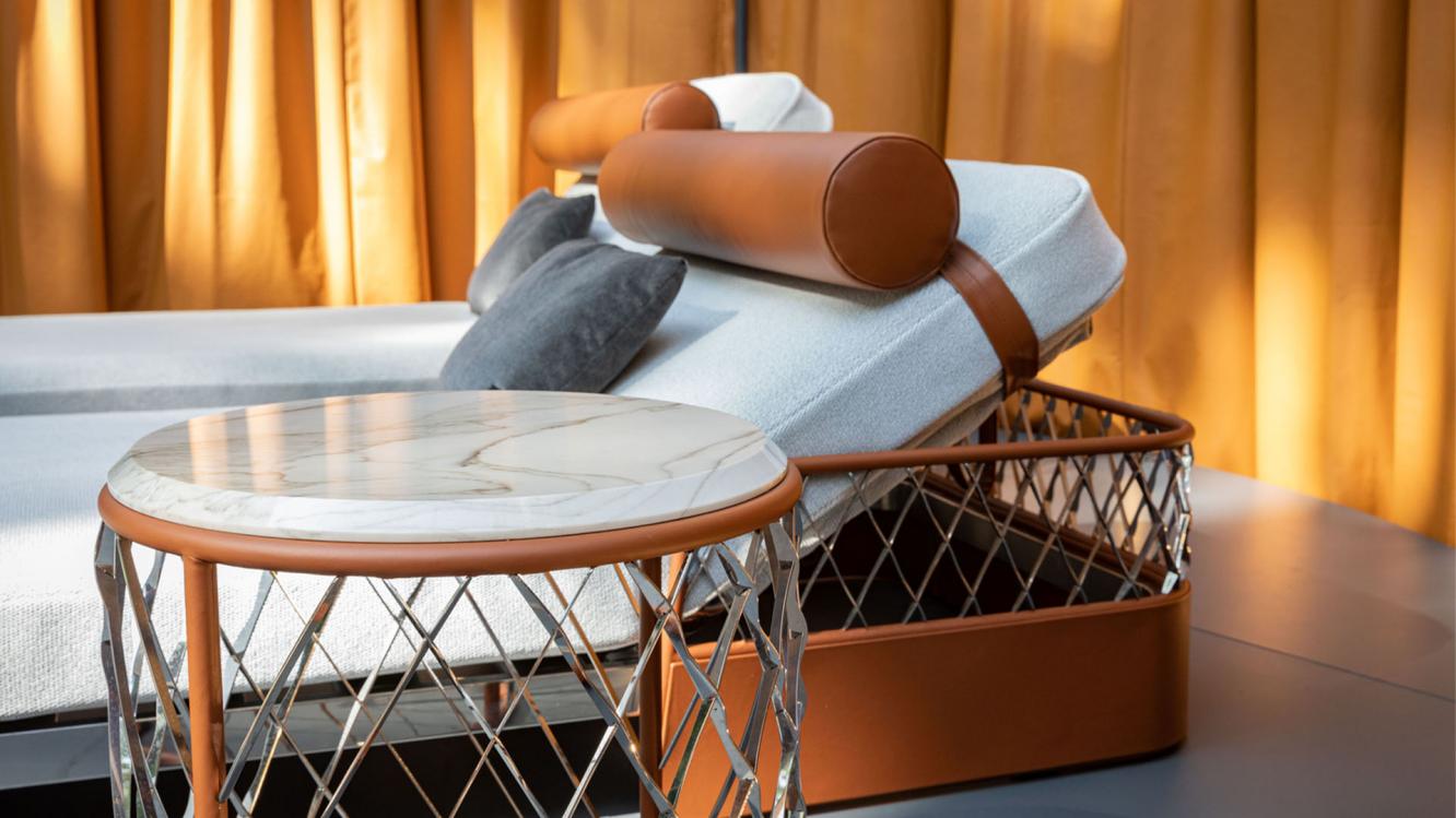 Bentley Solstice Collection for Bentley Home, featuring outdoor furniture and side table with polished marble.