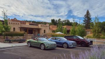 Bentley Continental GTC, Bentley Flying Spur and Bentley Bentayga EWB in Black Crystal over cricket ball parked infront of Bishops Lodge for Bentley Extraordinary Journey in New Mexico