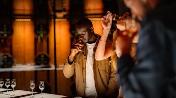 Participants of Bentley Extra Ordinary Journey UK, enjoying fine Macallan whiskey and Macallans Distillery.