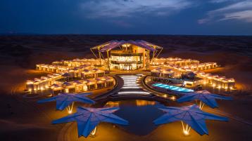View of luxury resort with illuminated rooms 