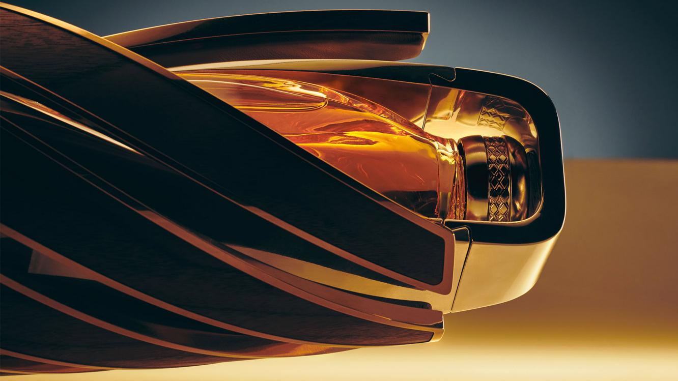 The Macallan Horizon bottle with 180 degrees twist featuring brushed aluminium casing enclosing wood.