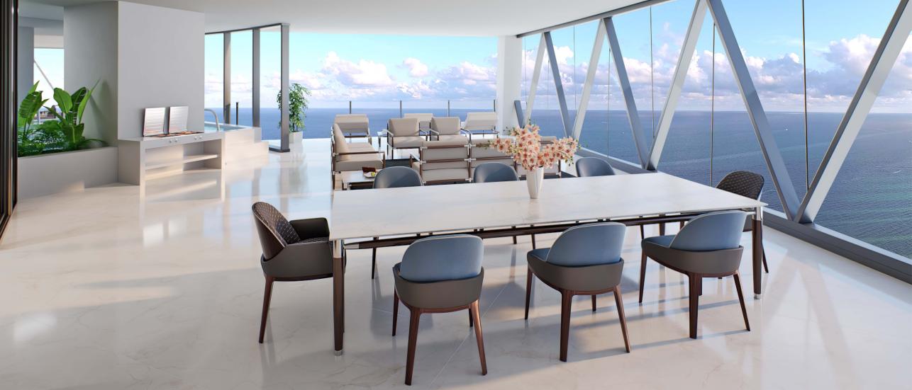 Bentley Residence Miami, with Bentley Home furniture on balcony overlooking the ocean.