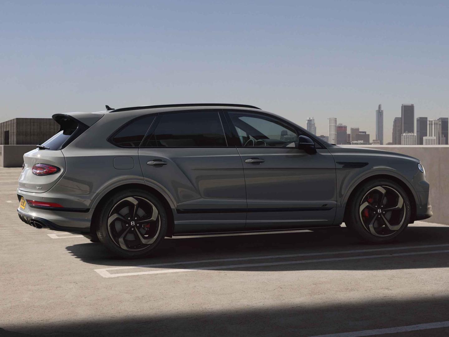 Cambrian Grey Bentley Bentayga S, parked in empty car park featuring 22 inch S directional wheel - Black Painted and Polished.