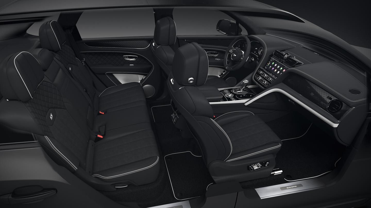 Full interior cabin overview of the Bentayga S Black Edition feature Beluga hide and Ice White contrasting trim
