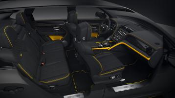 Full interior cabin overview of the Bentayga S Black Edition feature Beluga hide and Signal Yellow contrasting trim