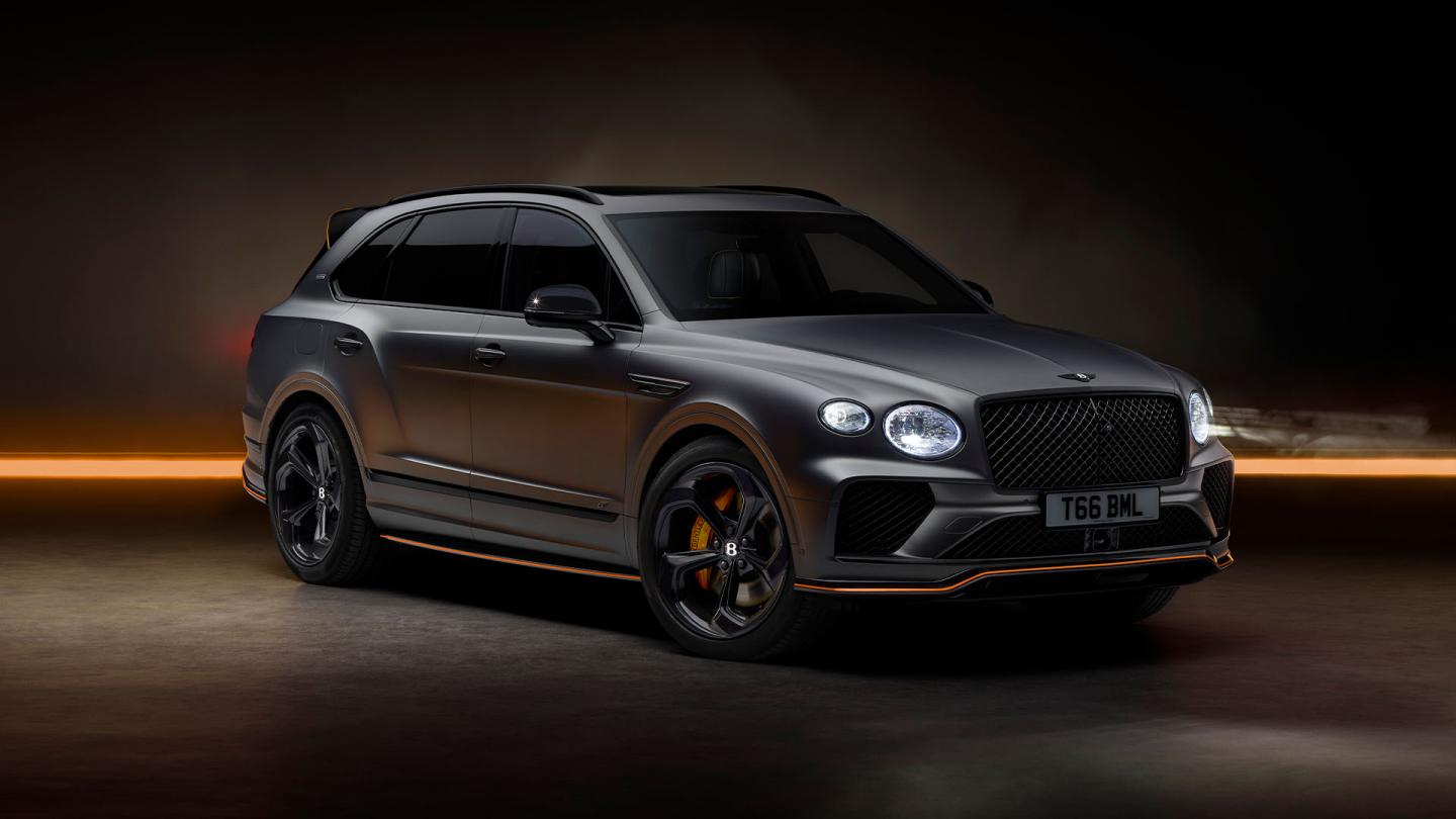 Bentley Bentayga S Black Edition front 3/4 featuring 22 inch S directional wheel - Black Painted and Polished as well as Mandarin accents on the styling kit