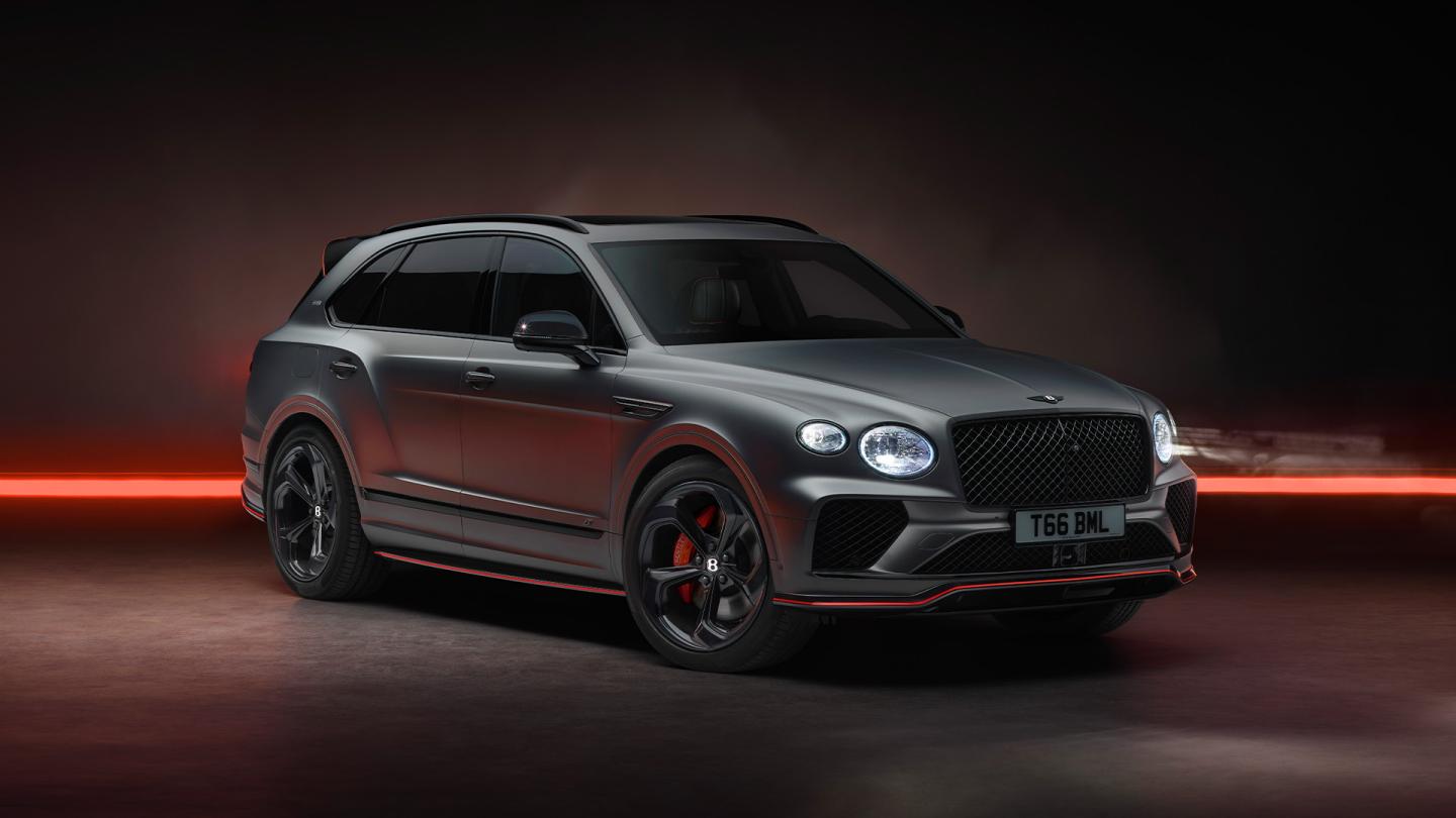 Bentley Bentayga S Black Edition front 3/4 featuring 22 inch S directional wheel - Black Painted and Polished as well as Pillar Box Red accents on the styling kit