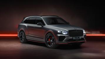 Bentley Bentayga S Black Edition front 3/4 featuring 22 inch S directional wheel - Black Painted and Polished as well as Pillar Box Red accents on the styling kit