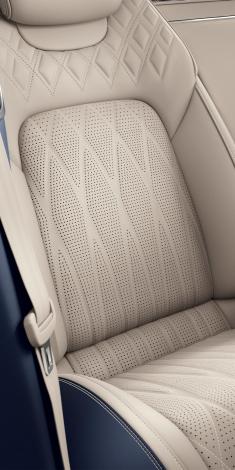 Close up on Bentley Continental GT Azure's Harmony Diamond Quilt patterned seats in Portland hide.  
