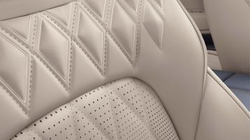 Close up on Bentley Continental GT Azure V8 Harmony Diamond Quilt patterned seats in Portland hide.