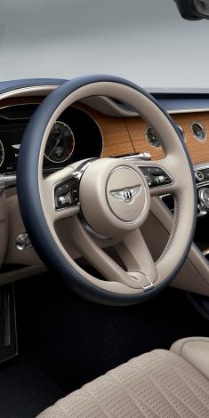 Interior view of Bentley Flying Spur Azure V8 featuring Heated, Duo-Tone, 3 Spoke, Hide Trimmed Steering Wheel.