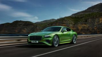 The first edition of the new Bentley Continental GT Speed driving on a bridge