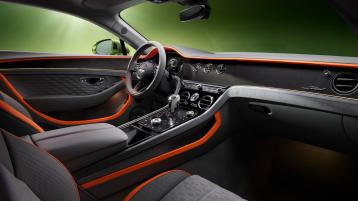 Cross cabin view of the new Bentley Continental GT Speed featuring Gravity Grey main hide and Mandarin by Mulliner secondary hide