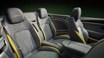 The rear cabin of the new hybrid Bentley Continental GTC Speed with a exclusive Speed colour split with Gravity Grey main hide and Hyper Yellow secondary hide