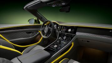 The front cabin of the new hybrid Bentley Continental GTC Speed with a exclusive Speed colour split with Gravity Grey main hide and Hyper Yellow secondary hide