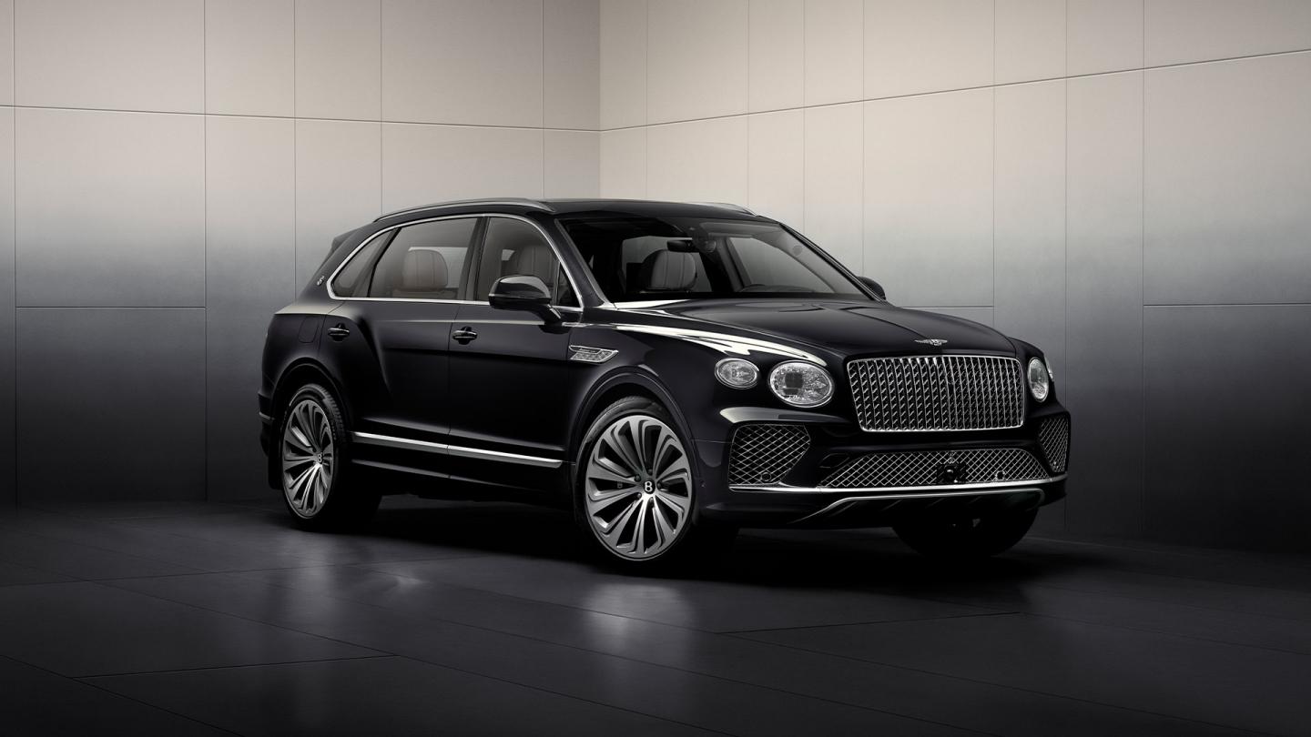 Front three quarter of the Bentayga Atelier Edition in Light Onyx exterior colour with bright chrome accents