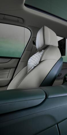 Close up of the front comfort seat in Portland main hide and Cumbrian Green secondary hide in the Bentayga Atelier Edition
