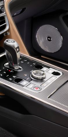 Close up of Bentley Flying Spur Mulliner driver controls and Naim for Bentley speaker