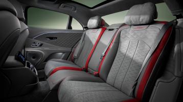 The rear cabin of the new hybrid Bentley Flying Spur Speed with a exclusive Speed colour split