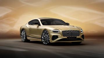 Front profile  of the new hybrid Bentley Continental GT Mulliner with a Patina exterior colour and exclusive Mulliner 22" directional wheels