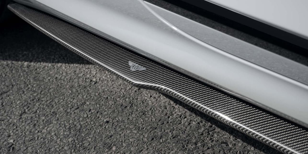 Carbon Fibre Styling Kit Close up of Bentley logo