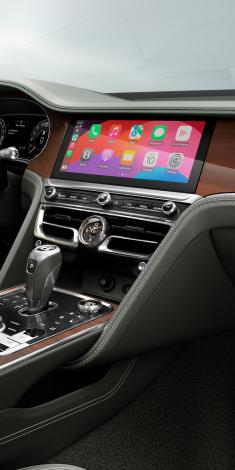 Close up of the MMI screen in the new hybird Flying Spur with Carplay
